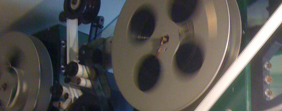 movie camera reels in motion